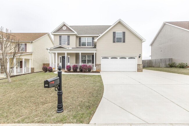 Building Photo - "Spacious 4-Bedroom Home with Granite Coun...