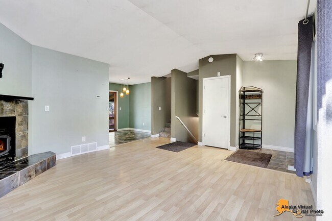 Building Photo - Eagle River Home w/ Fenced Yard, Sunroom, and Garage!