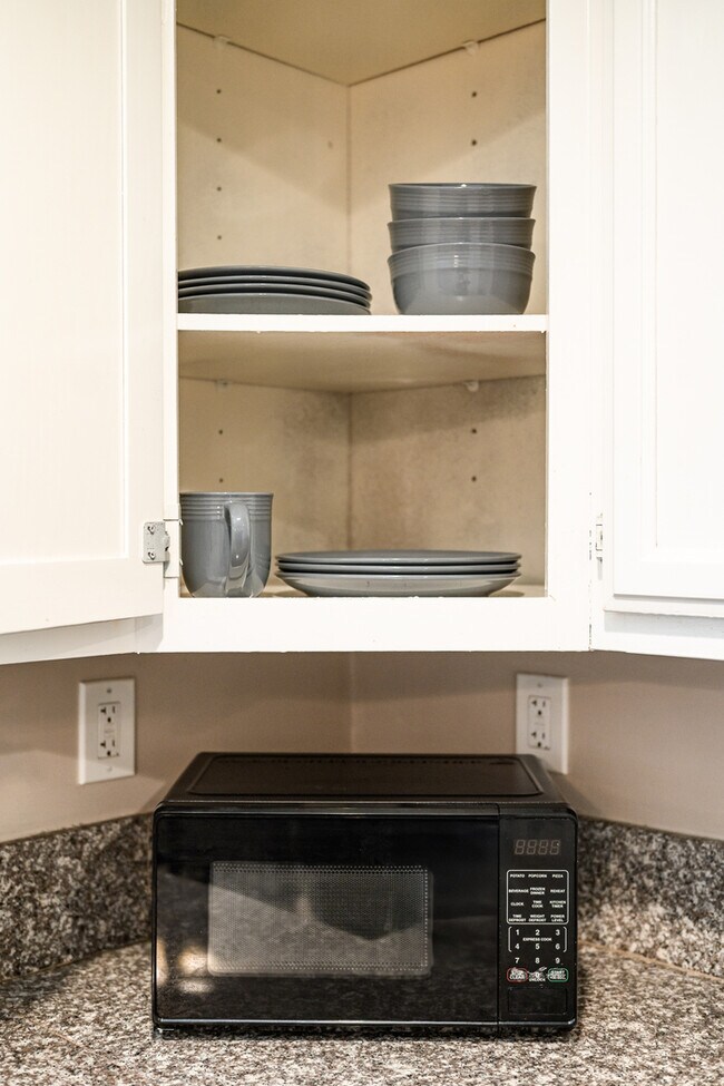 Building Photo - Fully Furnished 2BR Home with Crib — Mid-T...