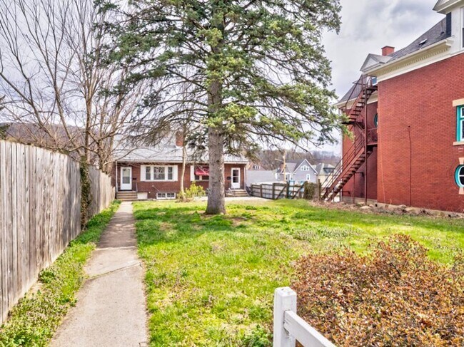 Building Photo - 1206-1206 5th Ave