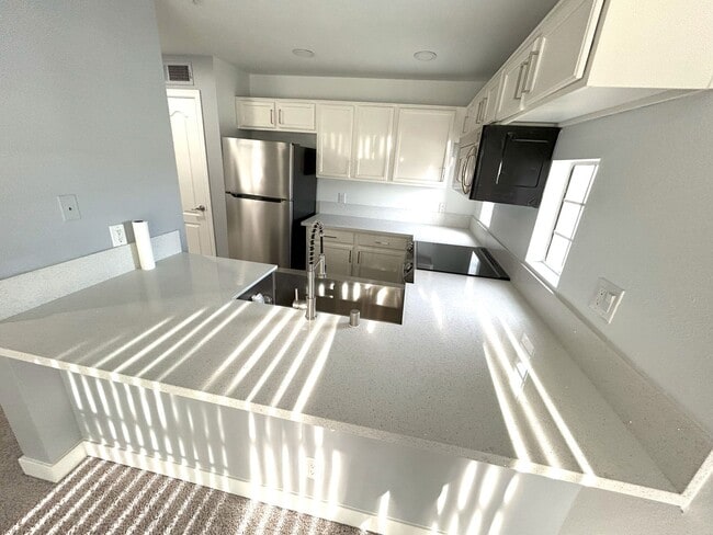 Building Photo - Charming 2-bedroom, 2-bath condominium ready to be called home!