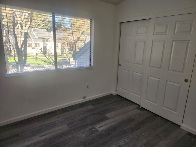 Building Photo - A Must See! Nice and bright, lots of light, two story condo in a well maintained complex.