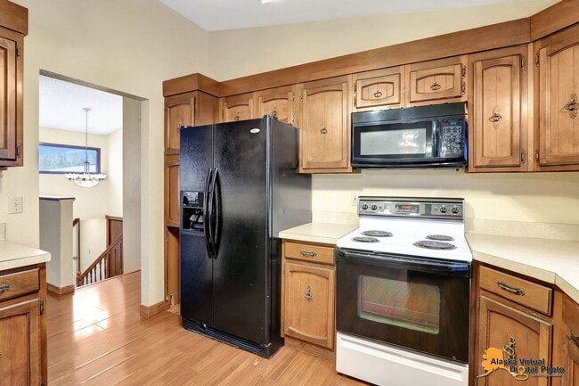 Building Photo - Spacious Home with Garage & Fenced Yard Near JBER & Major Hospitals