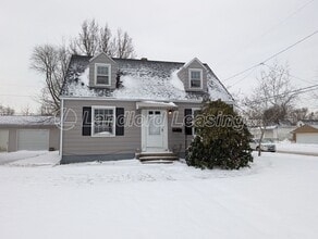Building Photo - Well-Maintained Cape Cod with Garage on Corner Lot