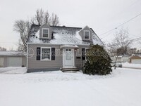 Building Photo - Well-Maintained Cape Cod with Garage on Corner Lot