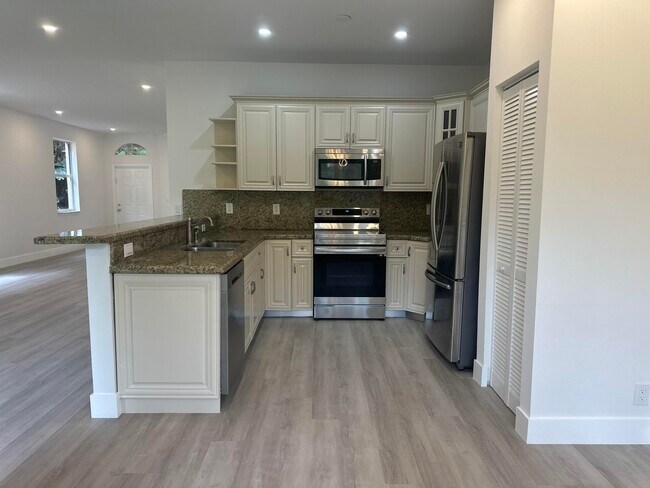 Building Photo - 10702 NW 1st Ct