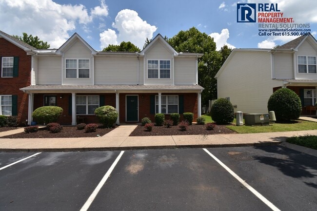 Building Photo - Adorable End Unit 2 bd Townhome with lawnc...