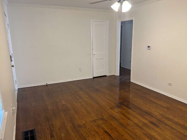 Building Photo - "Charming 4-Bed Lubbock Retreat: Granite Kitchen, Hardwood Elegance & Cozy Fireplace!"