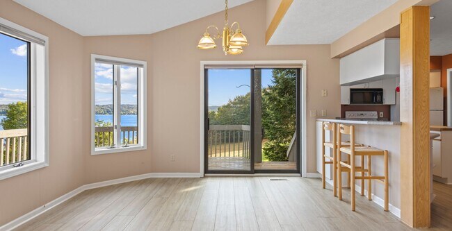 Building Photo - Lakefront End-Unit Condo with Crystal Lake...