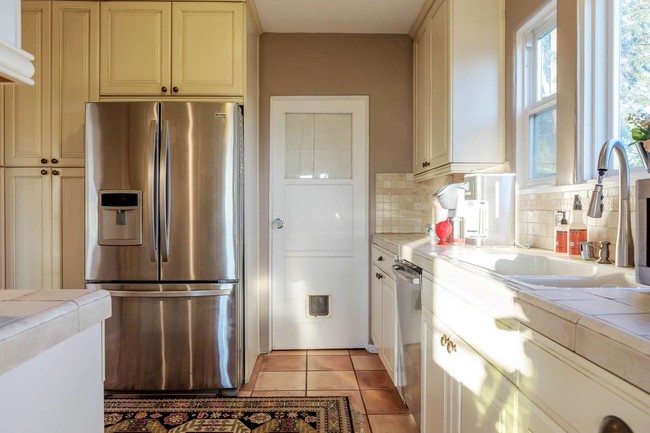 Kitchen & view of laundry room - 1980 Hillcrest Rd