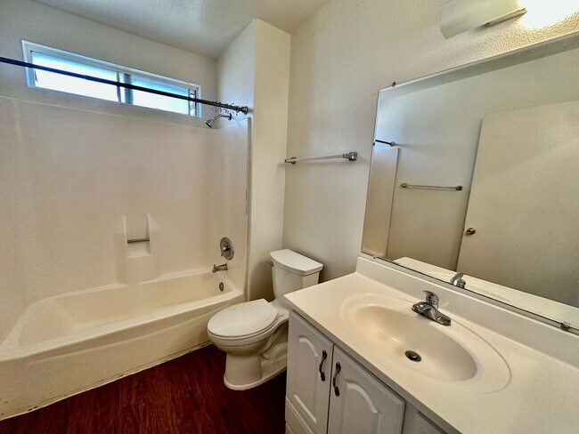 Building Photo - Upstairs 2 bedroom with 2 assigned parking spots!