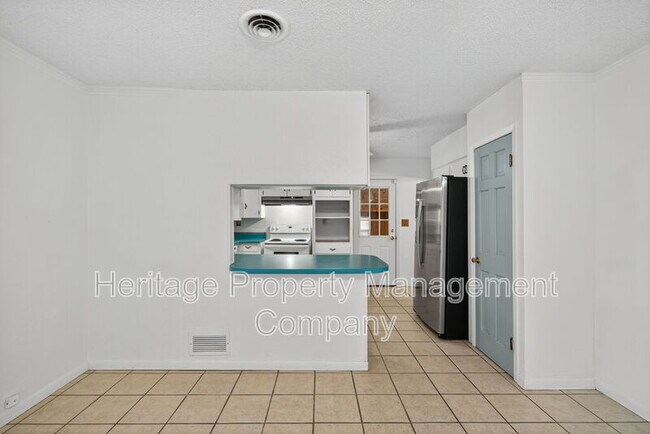 Building Photo - 7590 New Sulphur Springs Rd