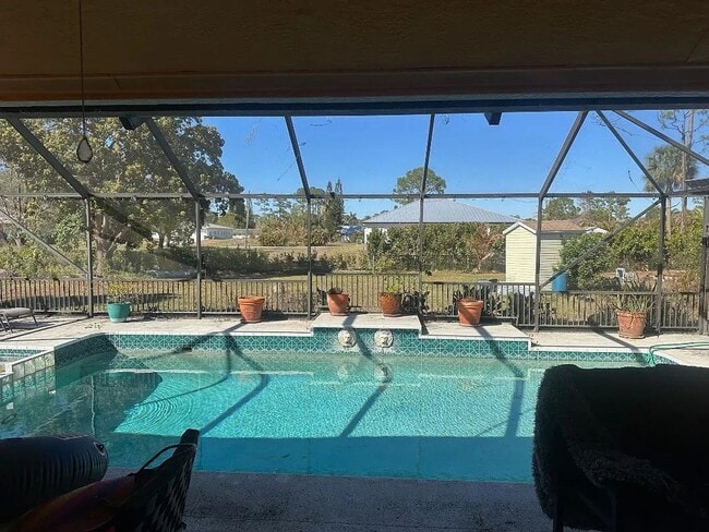 Building Photo - Beautifully Renovated Pool Home in The Acreage - 3bed | 2.5bath