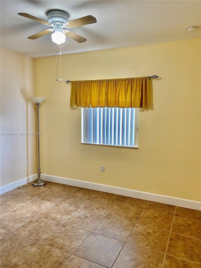 Building Photo - 11115 W Okeechobee Rd