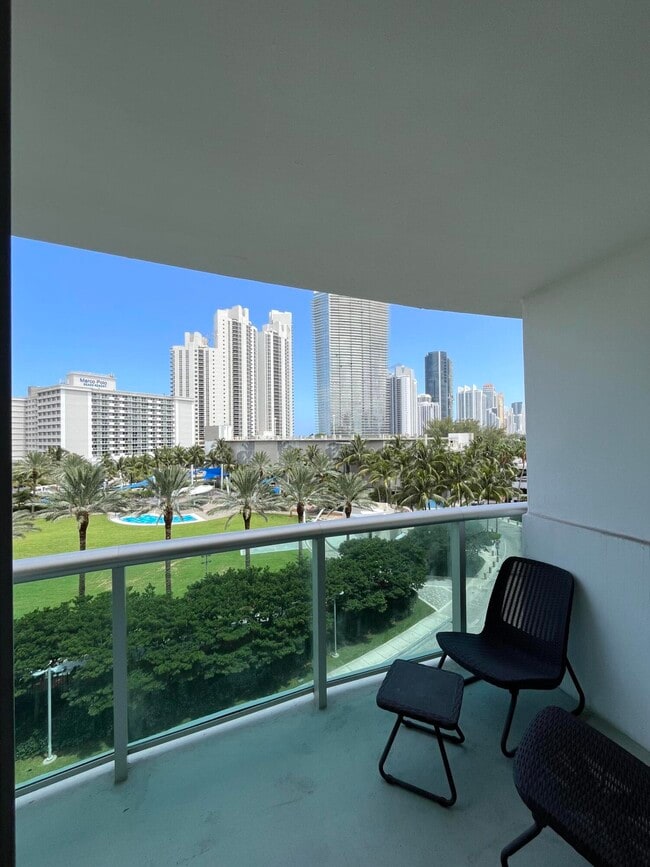 Building Photo - 19370 Collins Ave