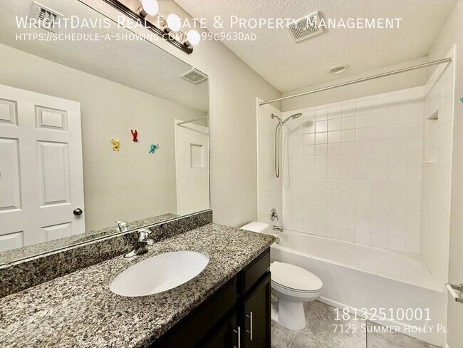 Building Photo - 7123 Summer Holly Pl
