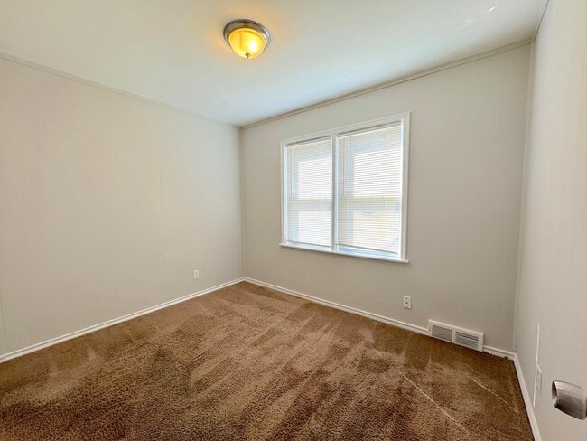 Building Photo - Updated 3 Bedroom Ranch with New Carpet, Fresh Paint, Fenced Yard & Basement!