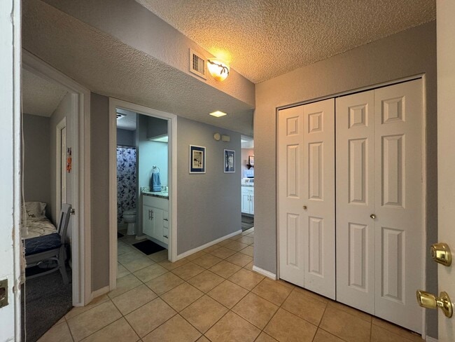 Building Photo - FURNISHED 2BR CONDO w/Utilities Water View Gated NO STAIRS