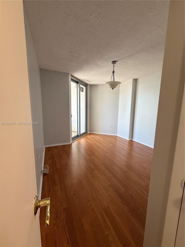 Building Photo - 5555 Collins Ave