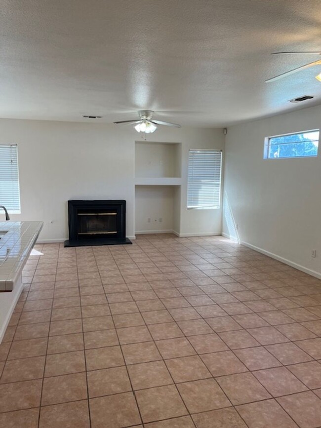 Building Photo - 4 Bedroom, 2 Bathroom Home with a Pool in ...