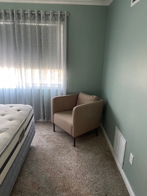Sitting chair in bedroom - 18900 Delaware St