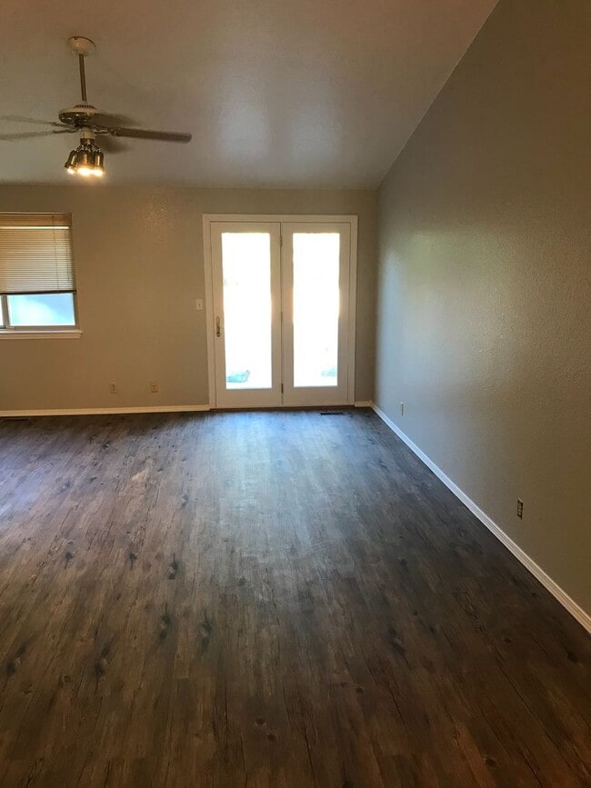 Building Photo - Coming in March – Beautiful Single-Story Home with Dual Living Spaces & Fenced Yard