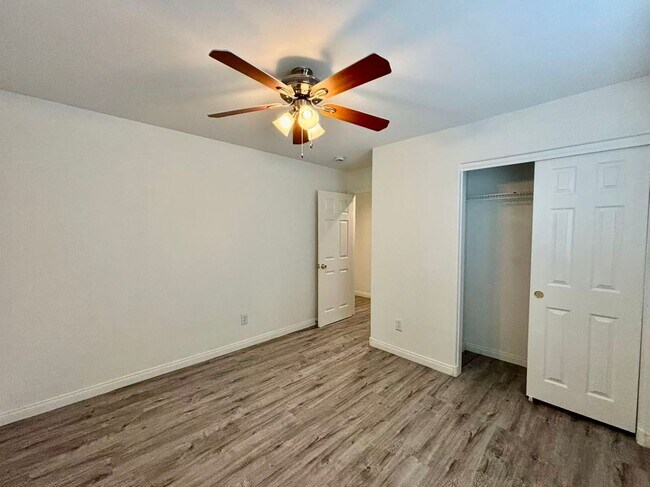 Building Photo - Welcome to this charming 4 bedroom, 2.5 bathroom home.