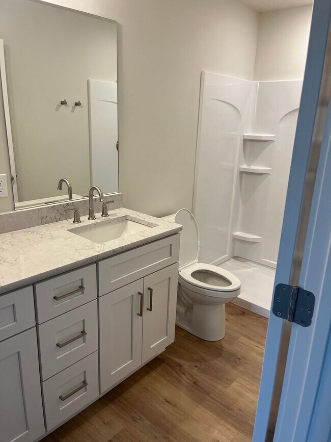 Building Photo - Spacious 5-Bedroom Duplex Near Asbury Elementary with Finished Basement & Full Amenities