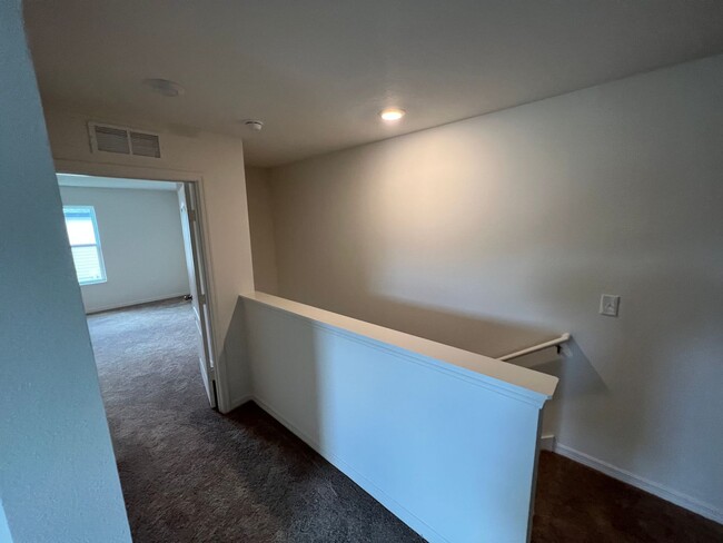 Building Photo - 2 car garage townhome-5310 Companion Lane ...