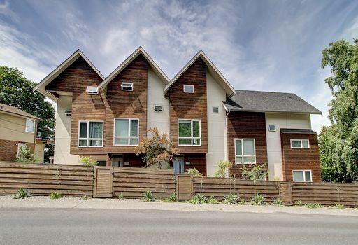 Building Photo - Industrial-Style Queen Anne Townhome with water views on every floor! AVAILABLE NOW!