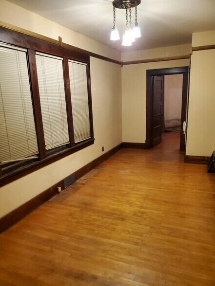 bedroom looking into dining room - 606 7th St N