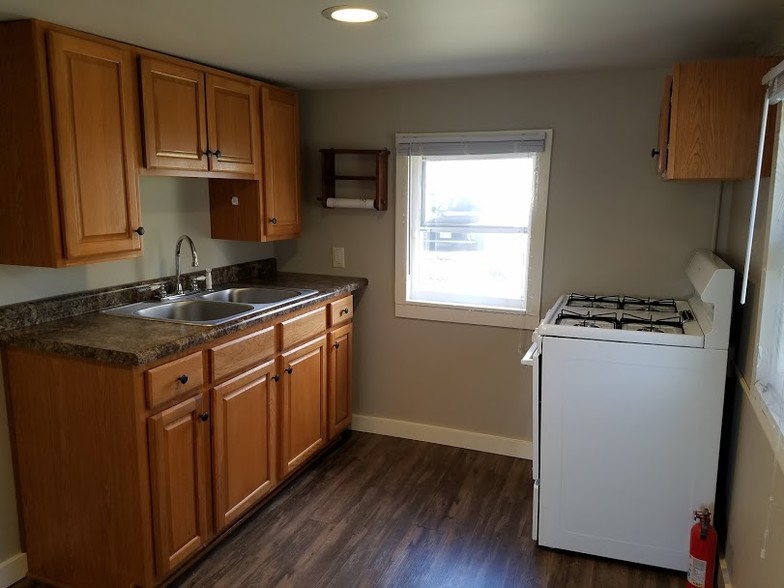 Kitchen includes stove - 103 12th W St