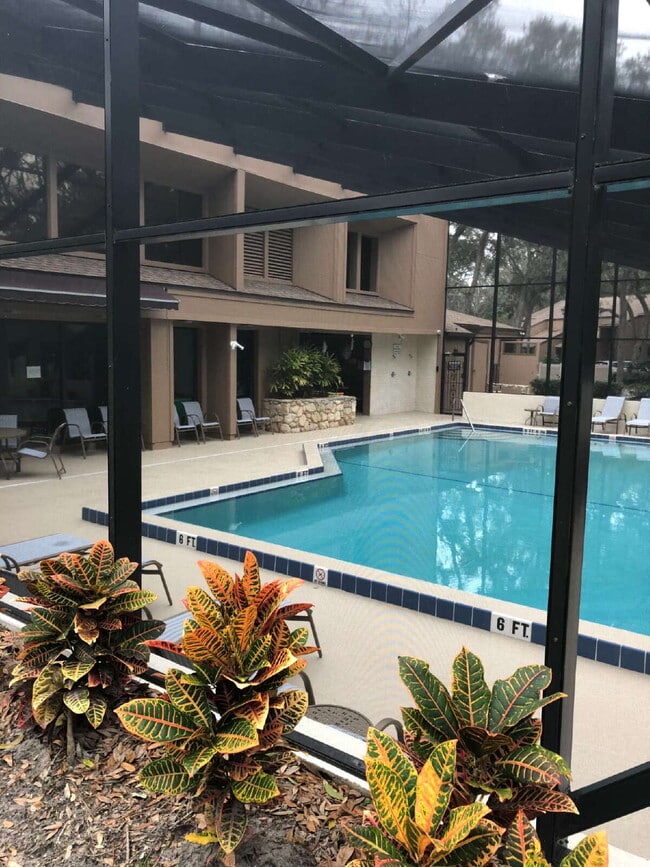 Building Photo - Second floor condo 2/1.5 located at the Fa...