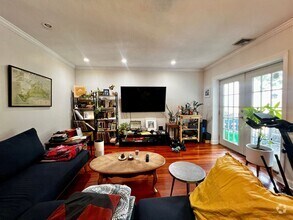 Building Photo - Stylish Top-Floor 2-Bedroom Condo with Pri...