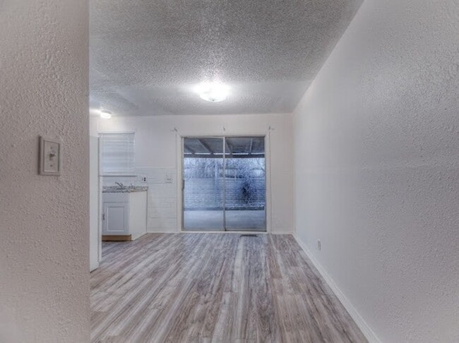 Building Photo - Updated 2 Bedroom Duplex with Attached Garage, Covered Patio & Move-In Ready!