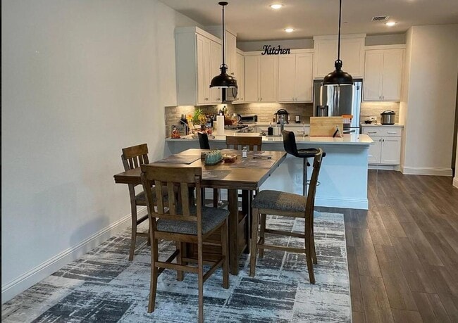 Building Photo - FULLY UPGRADED LUXURY TOWNHOME located in ...