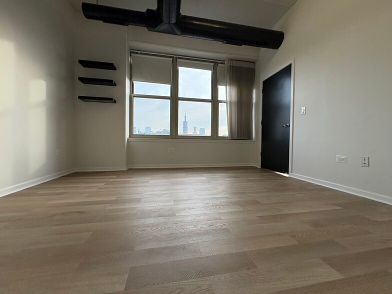 City Views from the primary bedroom - 6 S Laflin St