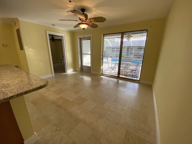 Living area with view to patio and pool area - 4225 SE 19th Ave