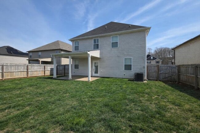 Building Photo - Get ready to fall in love—this sleek, modern beauty in West Creek Farms is bringing the wow facto...