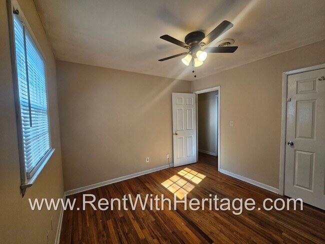 Building Photo - Great Brick Ranch / Harwood Floors / Huge Shop or Extra Storage / No Garage / Great Private Back ...