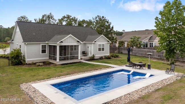 Building Photo - Welcome to this stunning 4-bedroom, 3.5-ba...