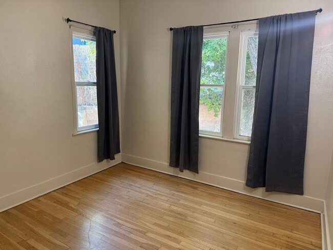 Building Photo - 4 Br, 2 Ba with kitchen appliances and basement for added storage.