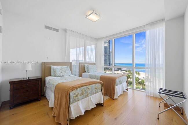 Building Photo - 18201 Collins Ave