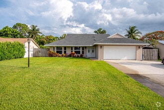 Building Photo - 5290 Pine Tree Dr