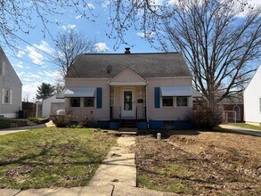 Building Photo - Bright Cape w/ Sunroom, Central Air, Big Basement & Backyard Shed
