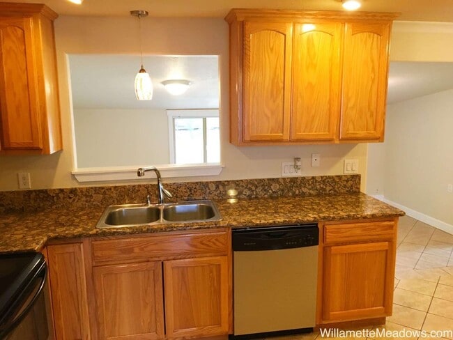 Building Photo - Spacious 4-Bedroom Home with Large Fenced Yard & Covered Patio