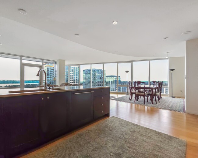 Building Photo - Elegant High-Rise Condo with Stunning Wate...