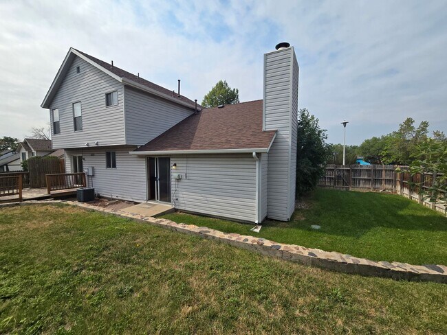 Building Photo - 3409 E 99th Dr