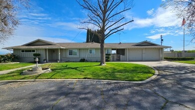 Building Photo - 7686 S Temperance Ave