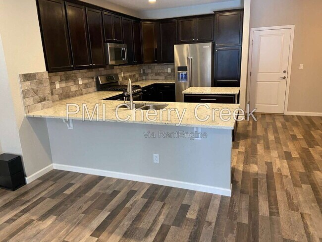 Building Photo - 9008 E Caley Way